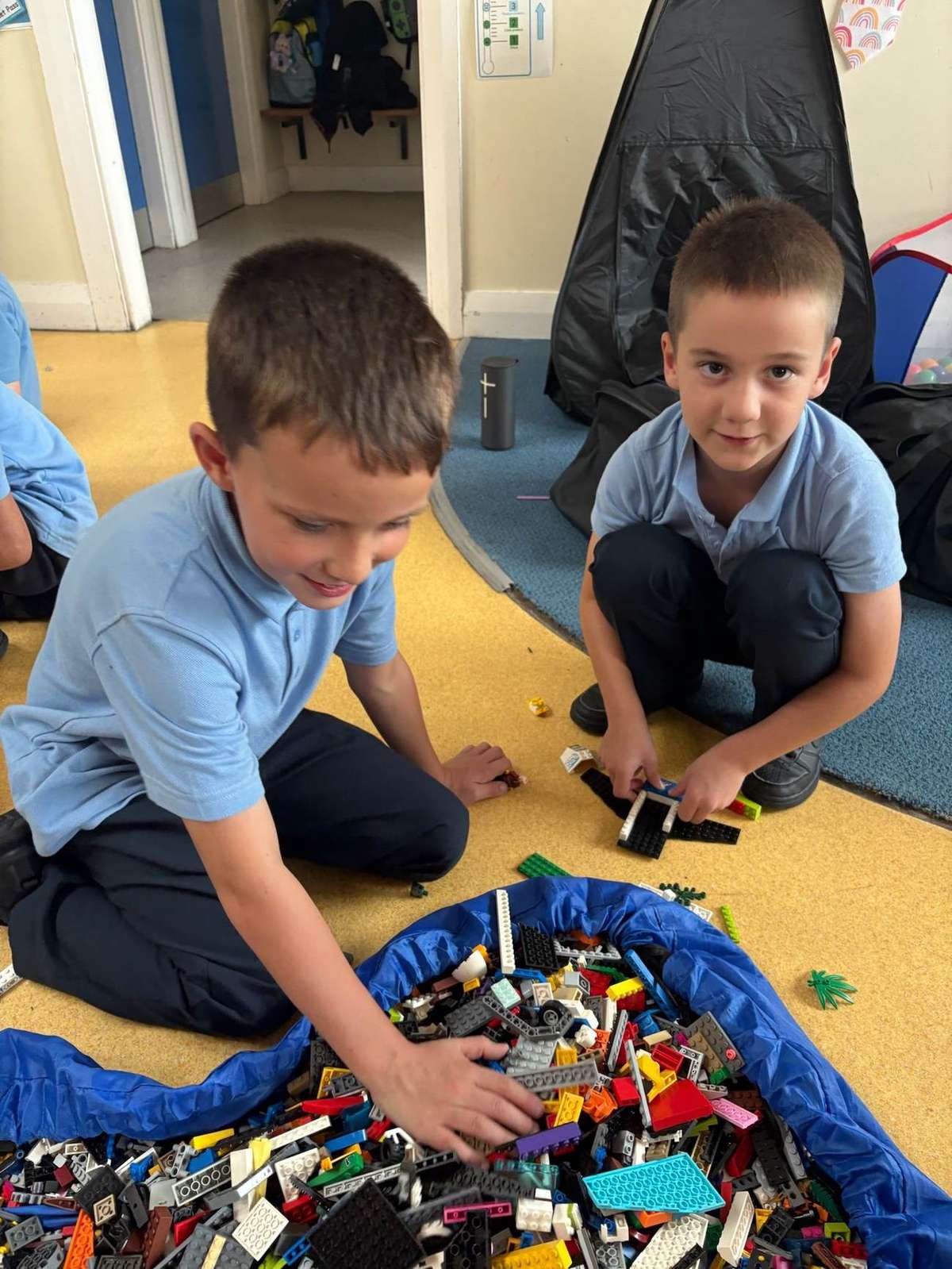 Children building with LEGO during an Elevate Sports after-school club