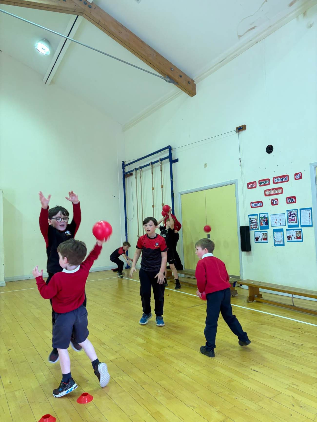 Children playing dodgeball during an Elevate Sports PE lesson