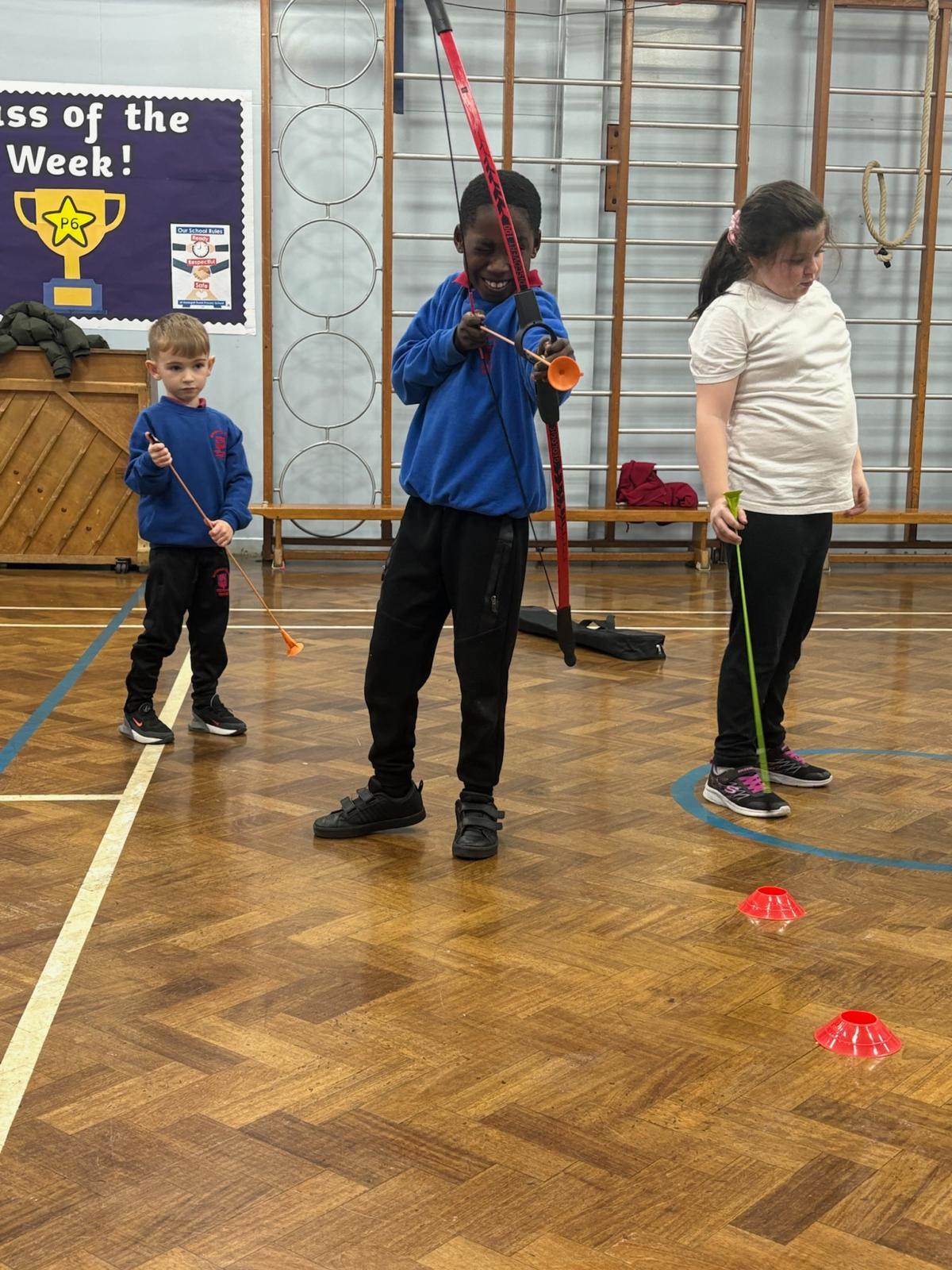 Children taking part in an archery session during an Elevate Sports Club
